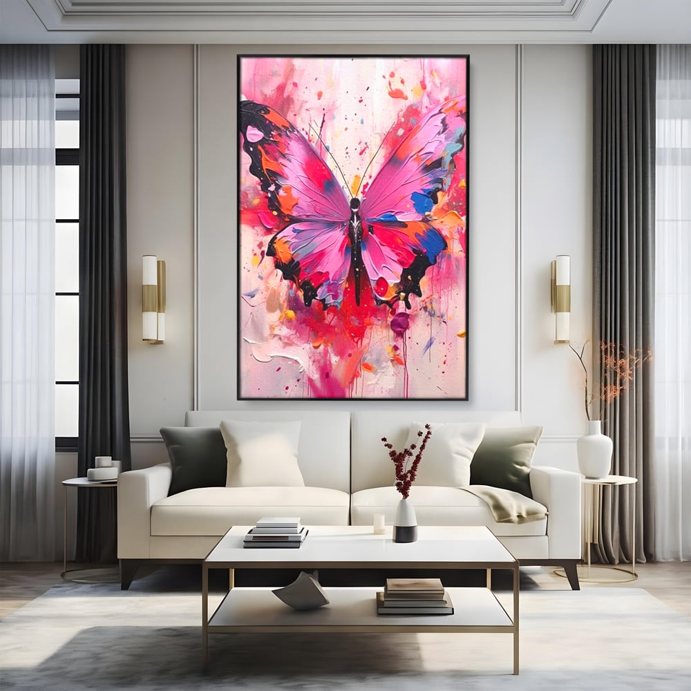 Tablou canvas cu pictura digitala cu fluture roz, in rama de aluminiu negru, pe perete intr-un living